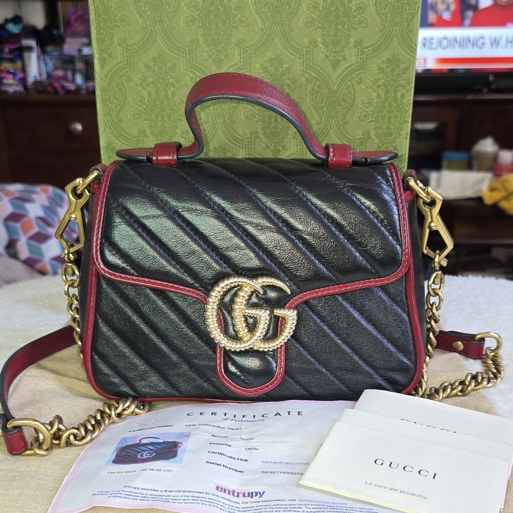 Black Gucci Mini GG Marmont
Torchon Top Handle Bag Satchel